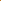 large bar bracelet stretched over orange surface.