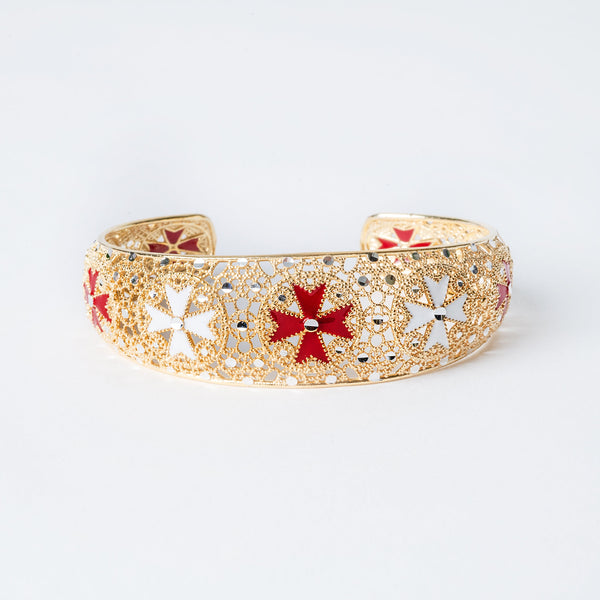 Cetta Bracelet of Gram sterling silver bracelet with yellow gold plating and red and white enamel detailing in a Maltese Cross pattern.