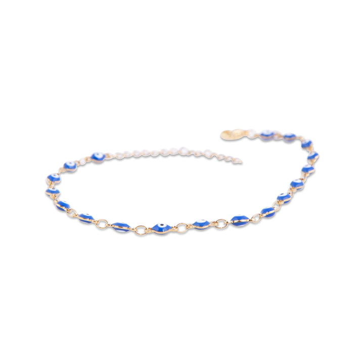 Gold anklet with blue accents on a white background