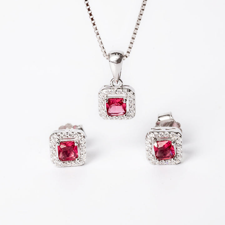 An Edith Set in red colour stones standing in the center of the image against a white background.
