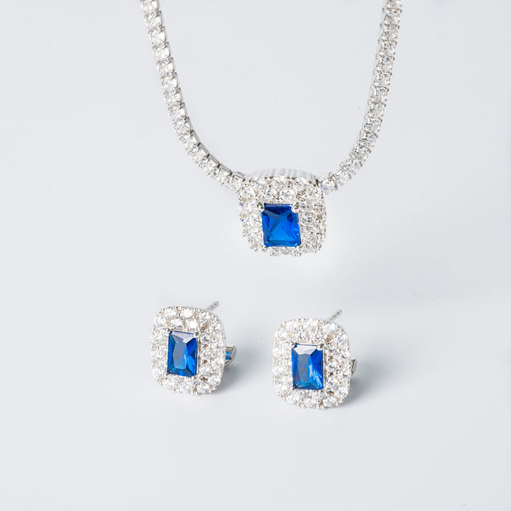 Elizabeth necklace and two separate pendants standing against a white background. 