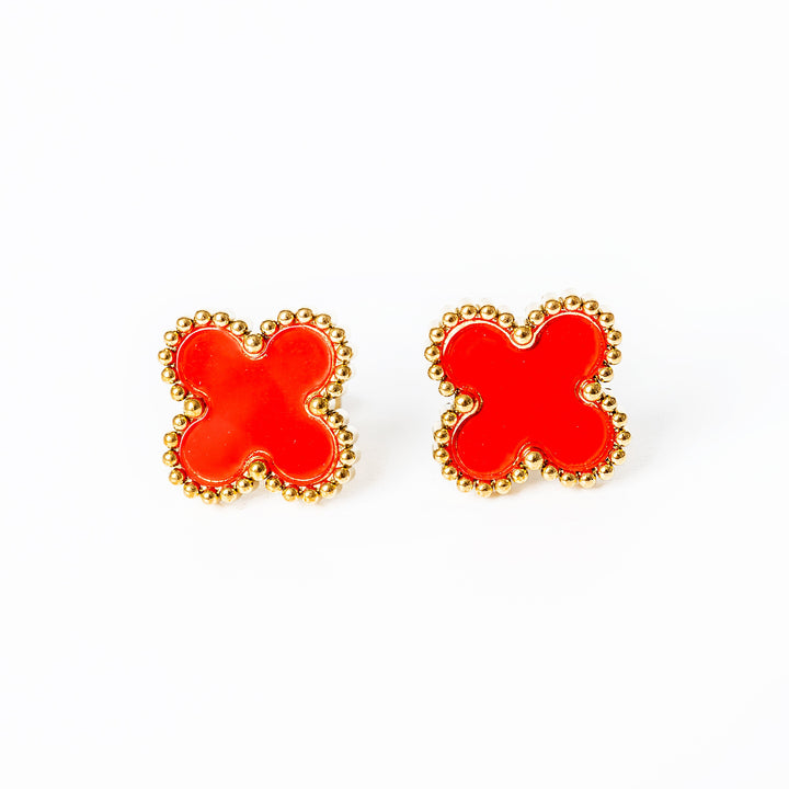 A red colour fiore set standing in the center of the image against a white background. 