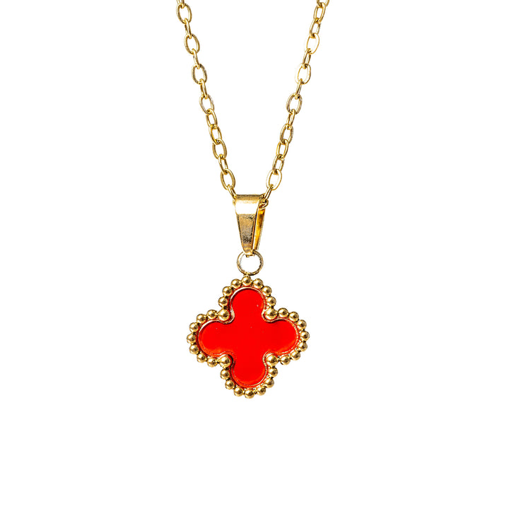 Red pendant Fiore necklace standing in the center of the image against a white background. 