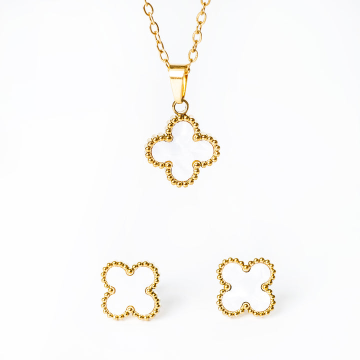 A close up view of Fiore Set with white pendant standing in the center of the image against a white background. 