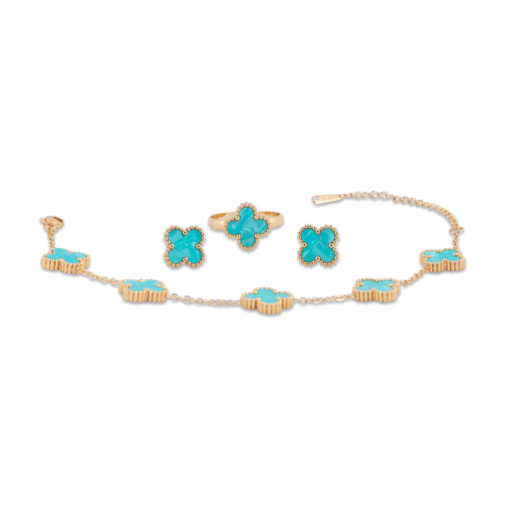 Floriana Jewelry set with turquoise stones and gold accents on a white background