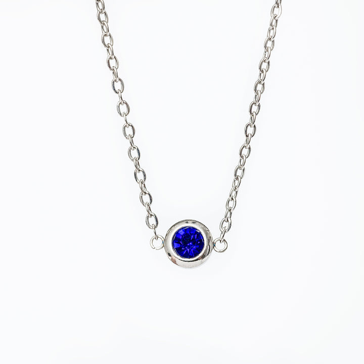 A close up view of Gabriella Silver Necklace in blue colour 