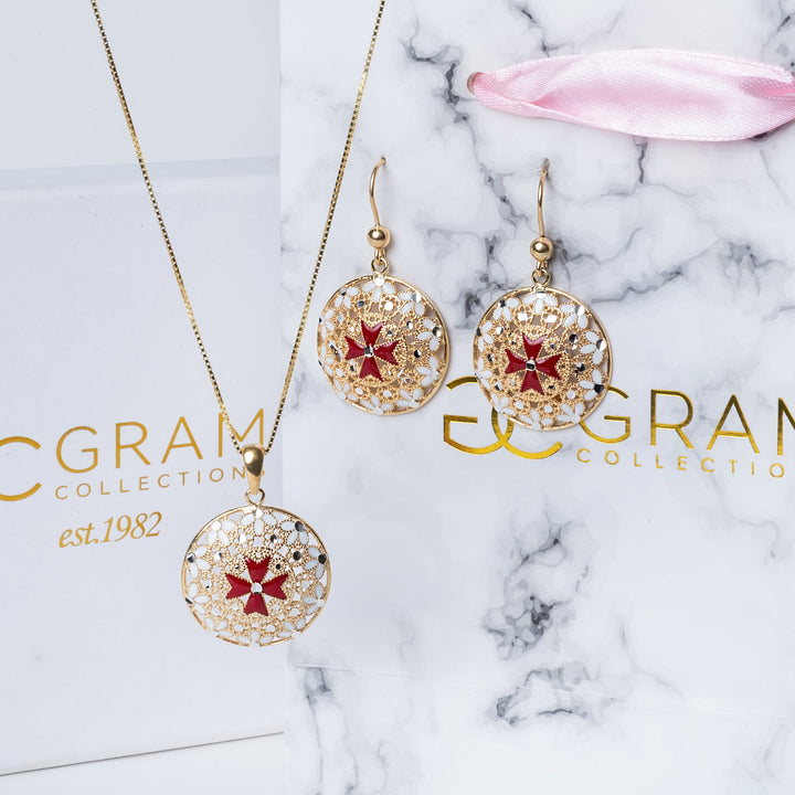 The gram collections, Gerit Necklace and earrings set placed on its box. 