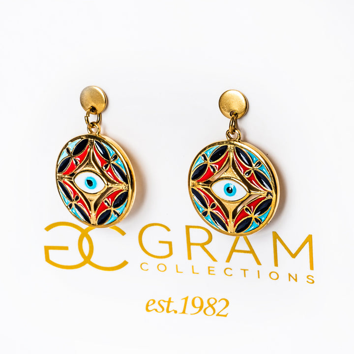 Decorative  Ghajn earrings with a colorful design on a white background, featuring the 'Gram Collections' logo.