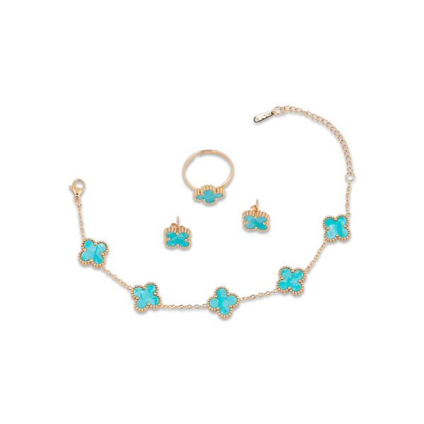 Gram Collections Floriana Jewelry set with necklace, ring, and earrings featuring turquoise clover-shaped stones on a white background.