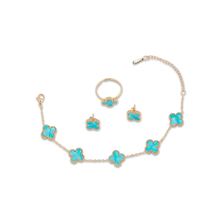 Gram Collections Floriana Jewelry set with necklace, ring, and earrings featuring turquoise clover-shaped stones on a white background.