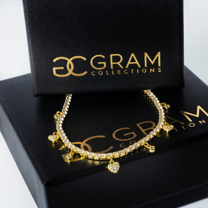 Gulia Necklace between its two of its boxes.