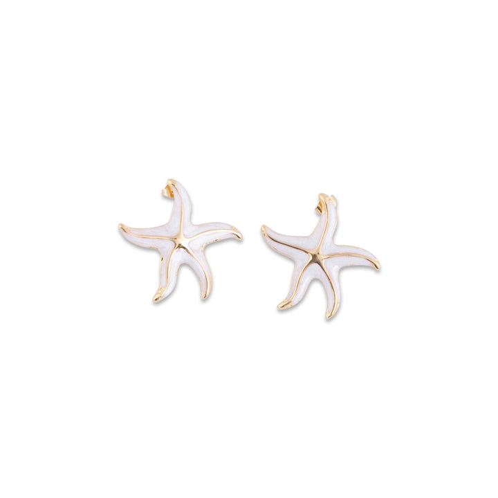 Isla Starfish-shaped earrings with gold and white finish on a white background
