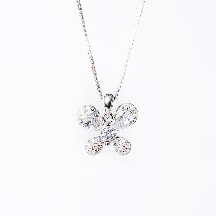 A close up of Jessie necklace standing in the center of the image against a white background. 
