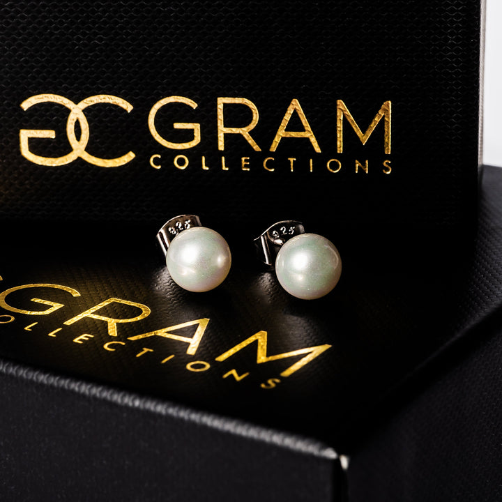 Lillian Earrings standing on its box against a white background. 