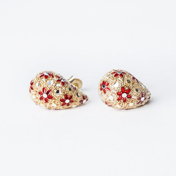 A pair of Lucija silver earrings with yellow gold accents and red enamel gems
