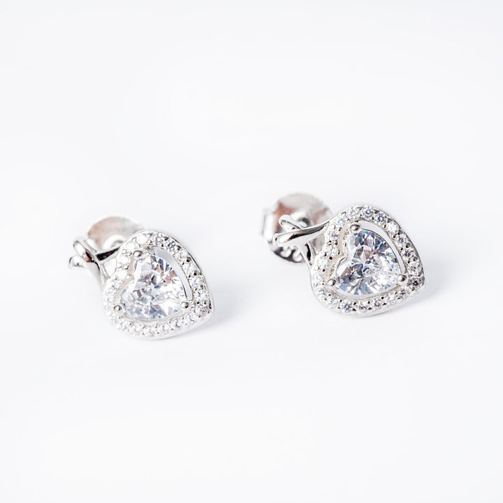 A close up view of Madisson earrings, standing against a white background 