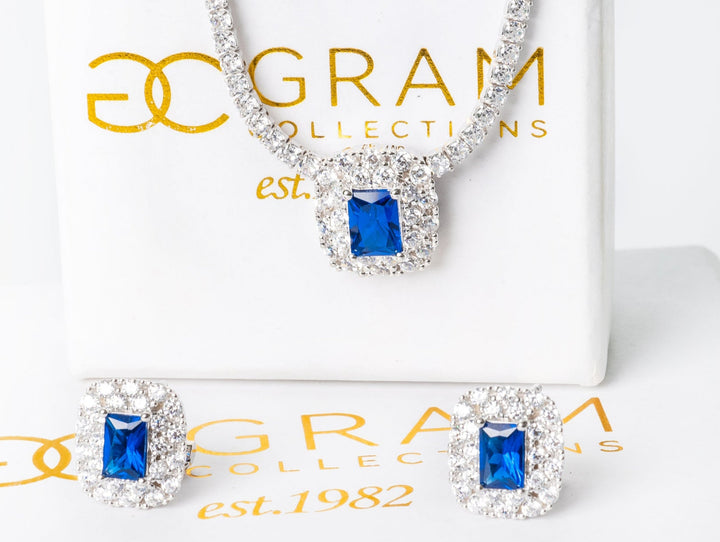 Maria Earrings standing on its box. 