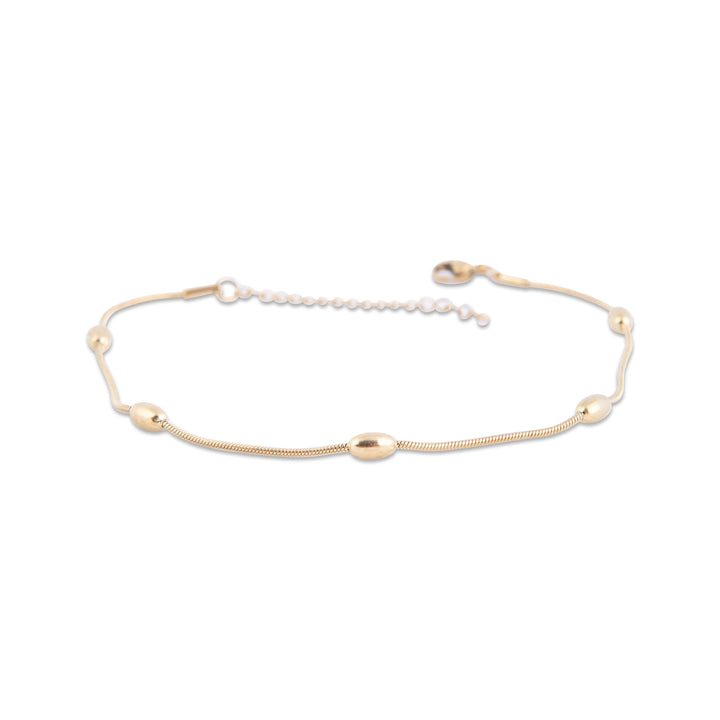 Mgarr Gold Anklet with small beads on a white background, gram collections 