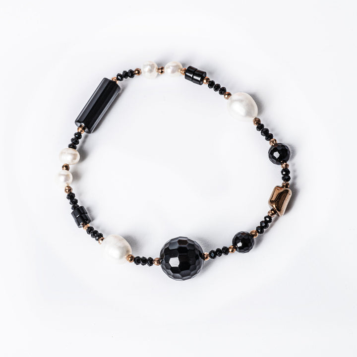 A birdview of MoonLight Bracelet placed in the center of the image against a white background. 