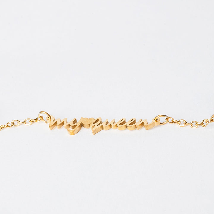 Gram Collections necklace side view surrounded by a white background. 