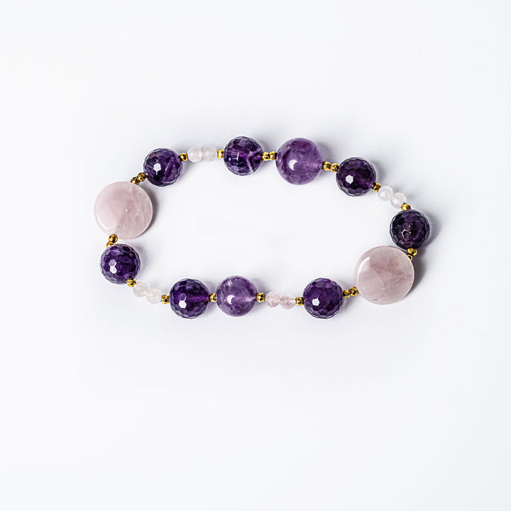 Orchid Bracelet close up standing in the center of the image against a white background 