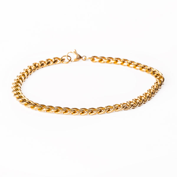 A yellow gold stainless steel bracelet with an adjustable clasp, displayed on a white background.