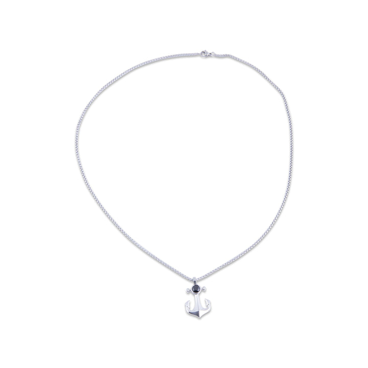 Silver necklace with an anchor pendant on a white background