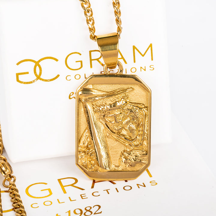 Gold pendant necklace with '3C Gram Collections' branding on a white background