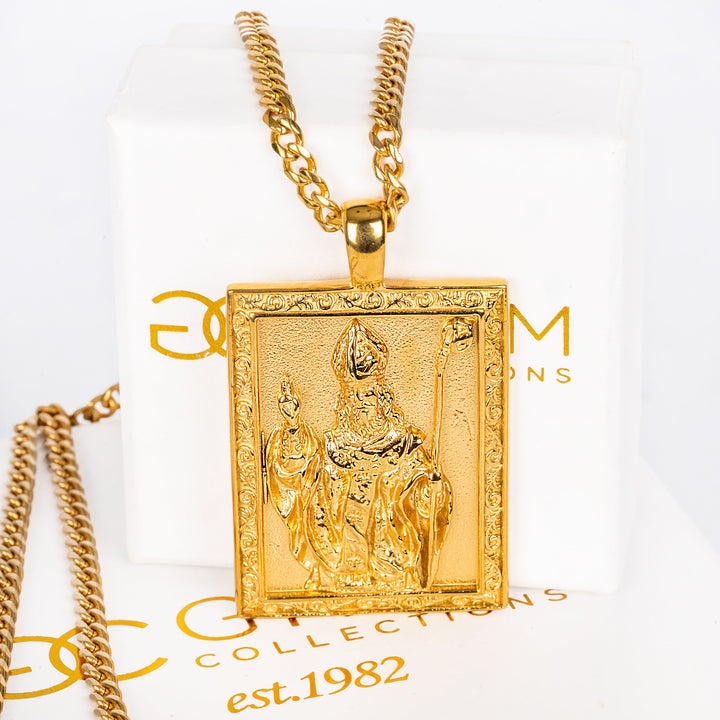 San Nikola Pendant necklace with its unique gram collection box standing in the center of the image. 