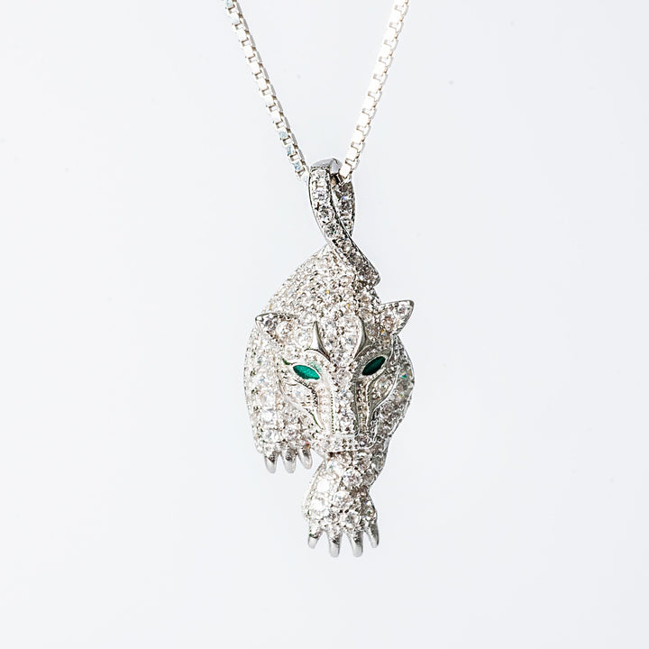 A Sophie necklace featuring a hypoallergenic and tarnish-free design, with a pendant in the shape of an animal's head adorned with cubic zirconia.