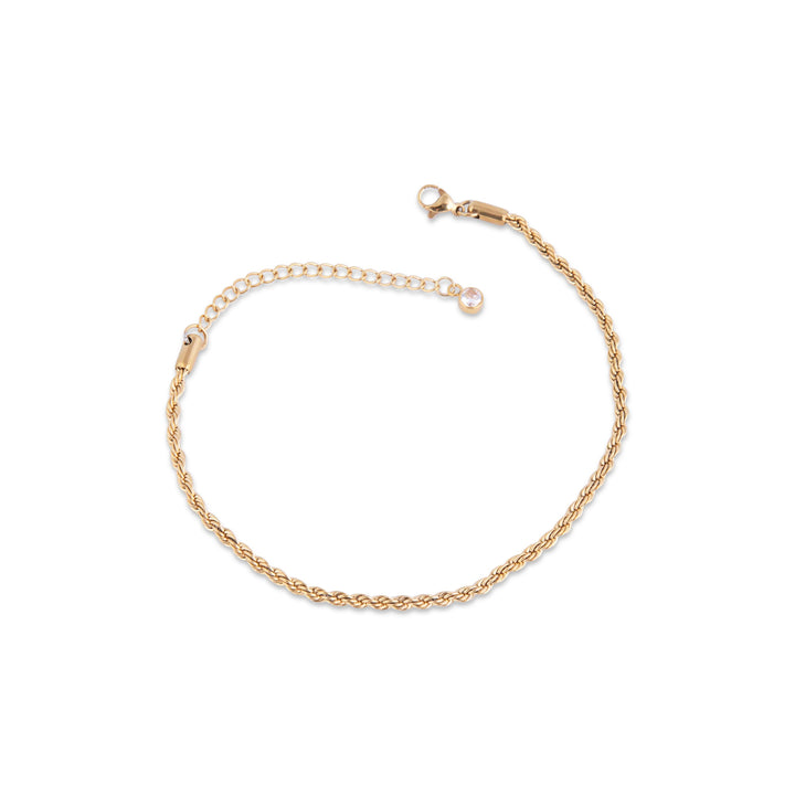 Ta' Xbiex Gold Anklet standing in the center of the image against a white background. 
