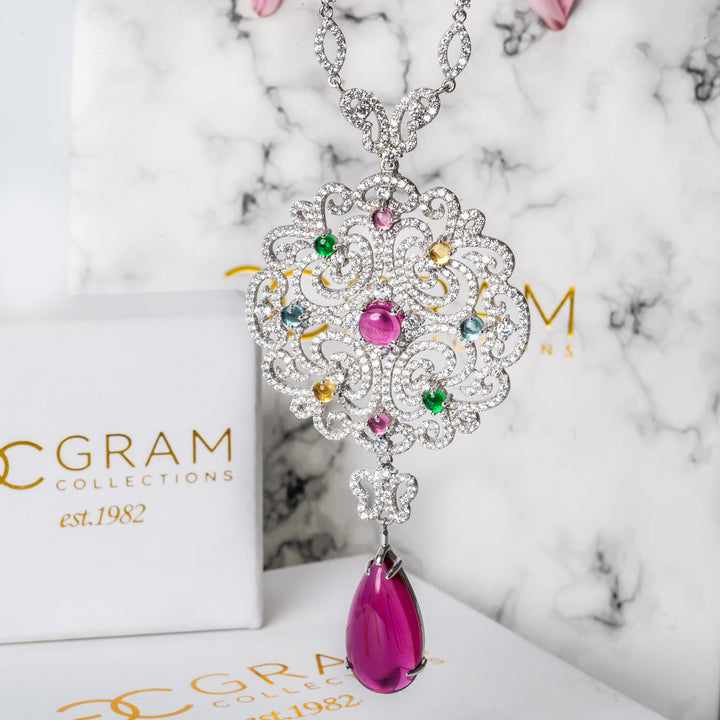 A close up look of Gram Collections Taryn Necklace against its box 