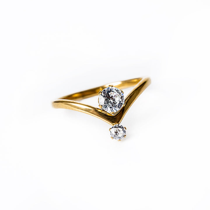 Vincianne Gold Ring standing in the center of the image against a white background. 