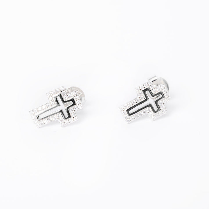 A close up view of Zelda crosses placed in the center of the image against a white background. 