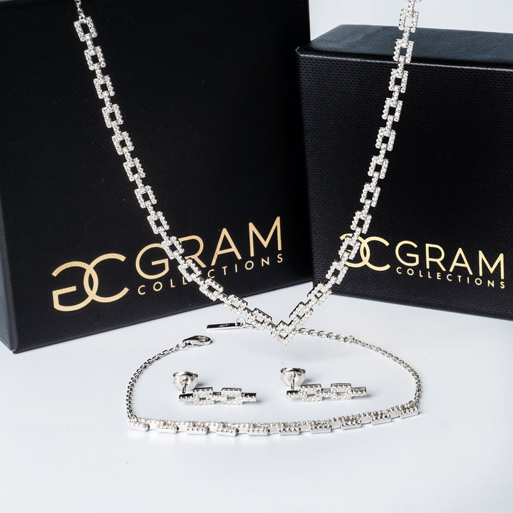 Alana Bracelet and its black boxes placed in the background. 