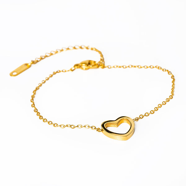 A yellow gold stainless steel Amata bracelet with a heart-shaped pendant