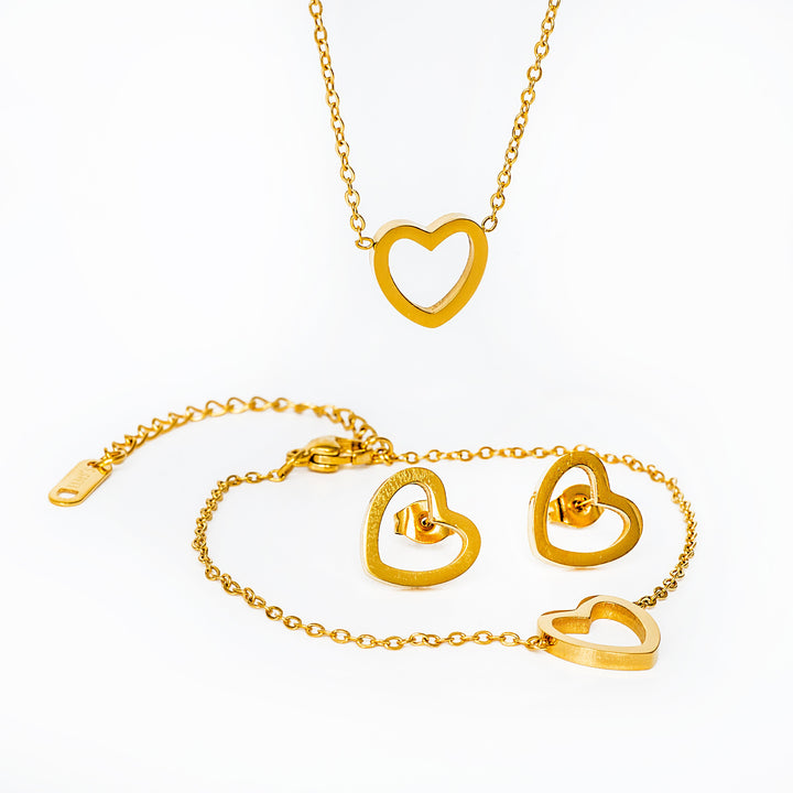 A close up view of Amata Gold Jewellery set standing in the center of the image against a white background. 
