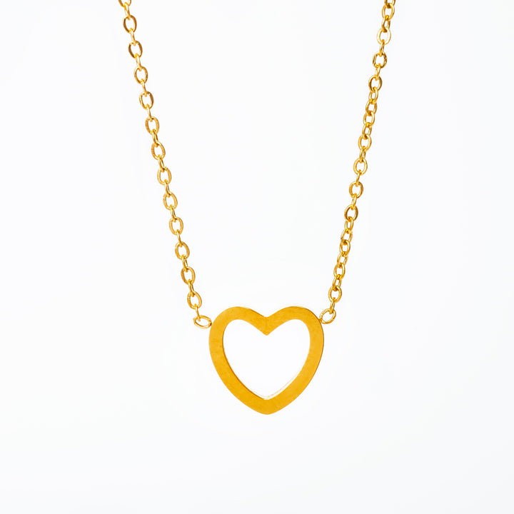 A yellow gold stainless steel Amata necklace with a solid pattern, featuring a yellow gold heart-shaped pendant.