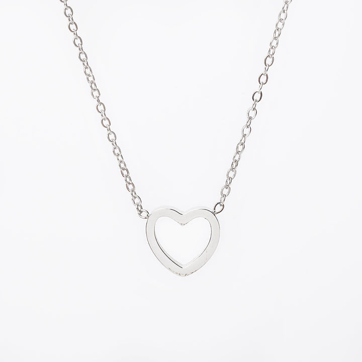 Amata silver necklace with a heart-shaped pendant, displayed against a white background.
