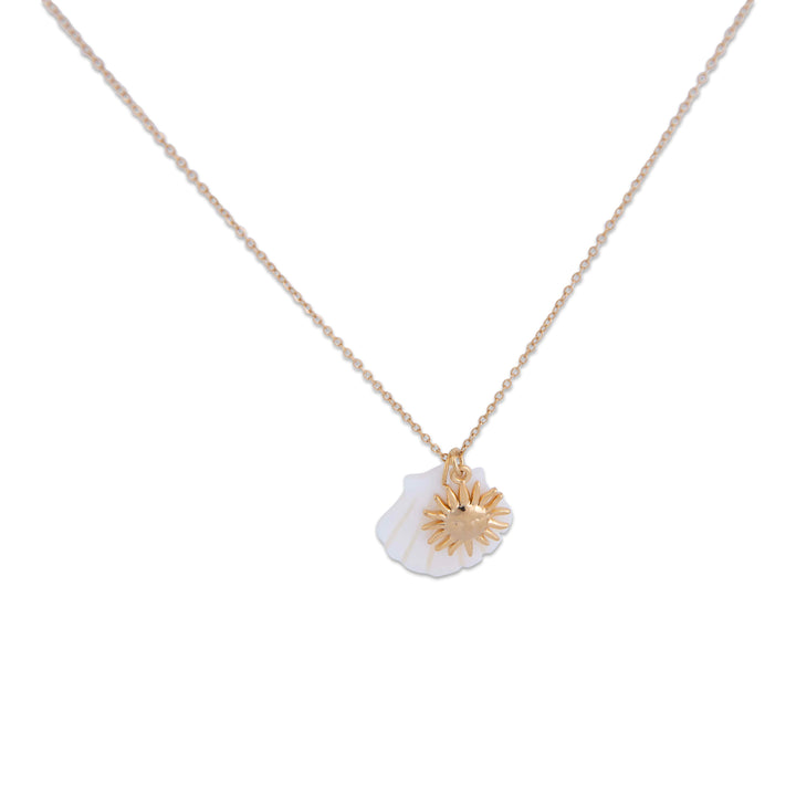 Gram Collection Anchor Bay Necklace with a white pendant featuring a gold sun design on a white background