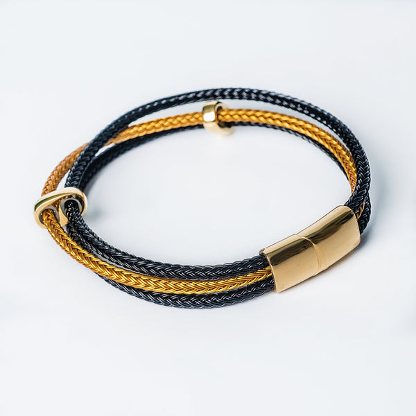 Black and gold braided Barcelona Bracelet with polished gold magnetic clasp