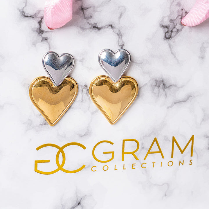 Bella Earrings attached to their uniquely designed gram collection box. 
