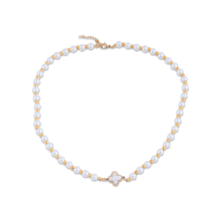 Birgu pearl necklace with gold accents on a white background.