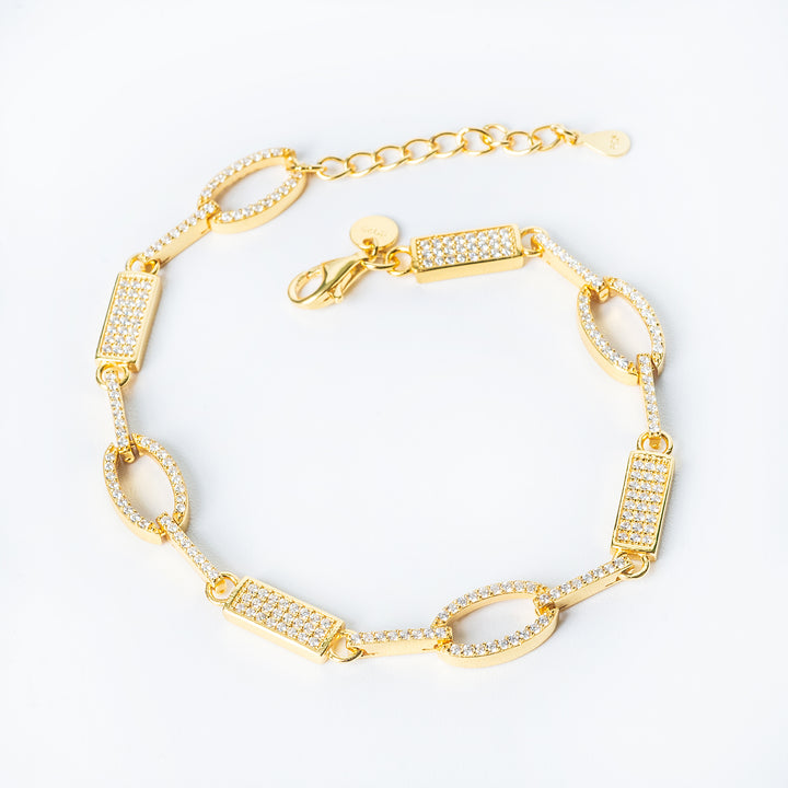 Birmingham Bracelet in gold with alternating oval and rectangular links set with small sparkling stones