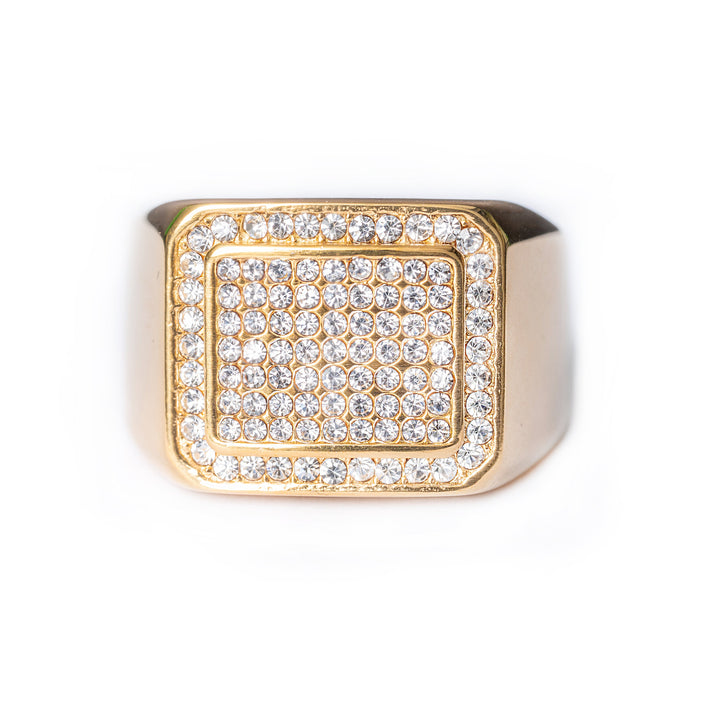 Gold Bobby Ring with a square pavé top set with clear round stones on a white background