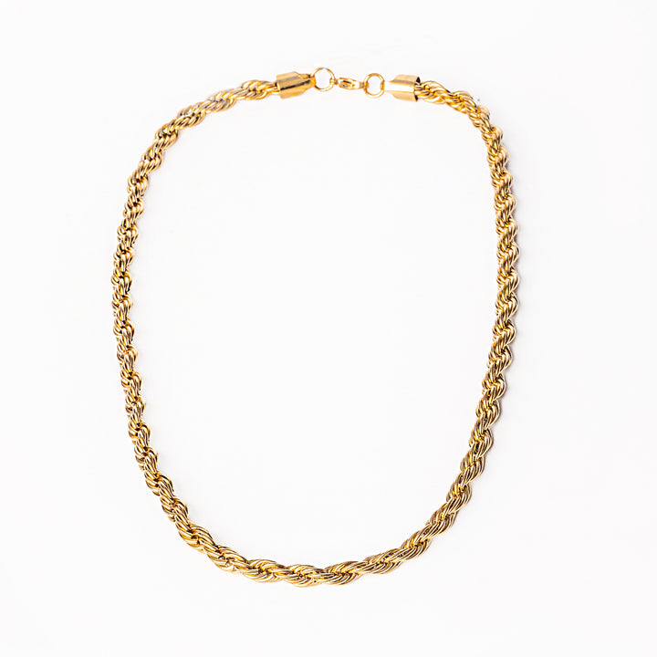 A close up view of Bologna necklace's chain standing in the center of the image against a white background