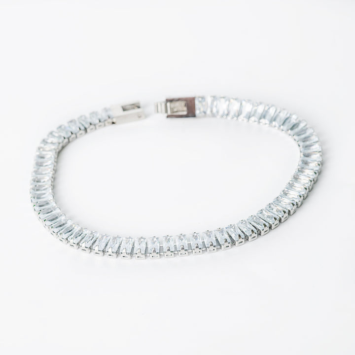 Silver Brooke bracelet featuring rectangular clear gemstones set along the full length.