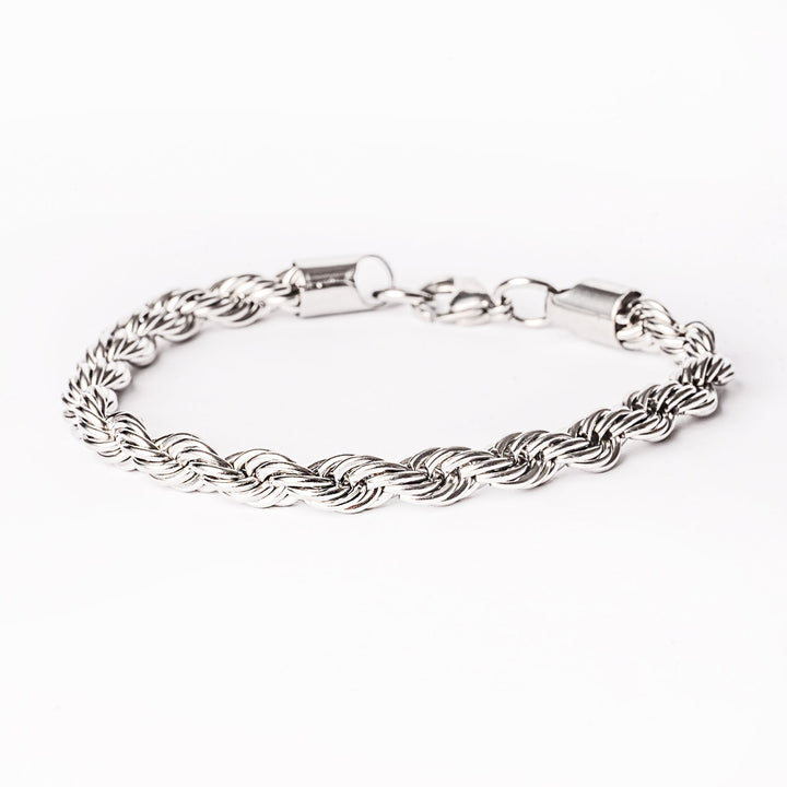 A silver stainless steel Calgari bracelet with a solid pattern and a clasp closure, displayed on a white background.