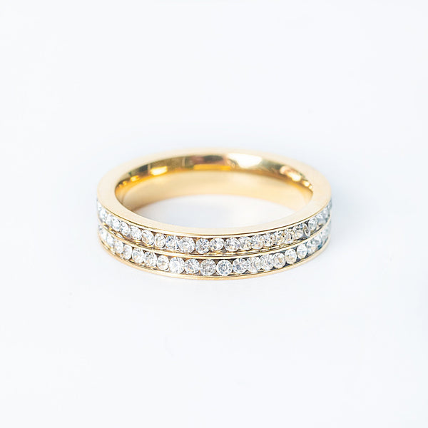 Gold Camila ring featuring two rows of clear gemstones around the band.