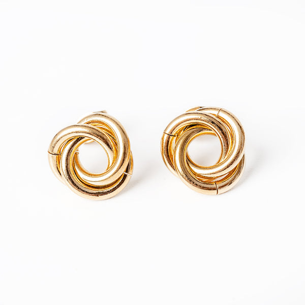 A pair of yellow gold-plated stainless steel earrings with a double helix design, displayed against a white background.